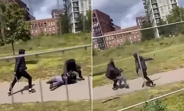A brutal machete duel at Sunday lunchtime, another scene from Khan's 'safe' London: Video captures masked