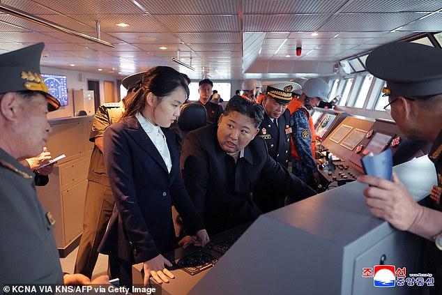 Kim Jong Un vows to build nuclear-armed navy with 'secret underwater weapons' as he tours warship with his daughter
