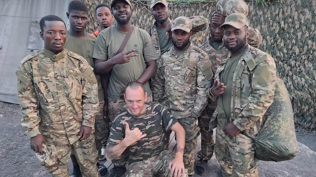 PICTURED: The Oldham antiques dealer and proud socialist who boasts of feeding desperate African fighters into Putin's meat grinder