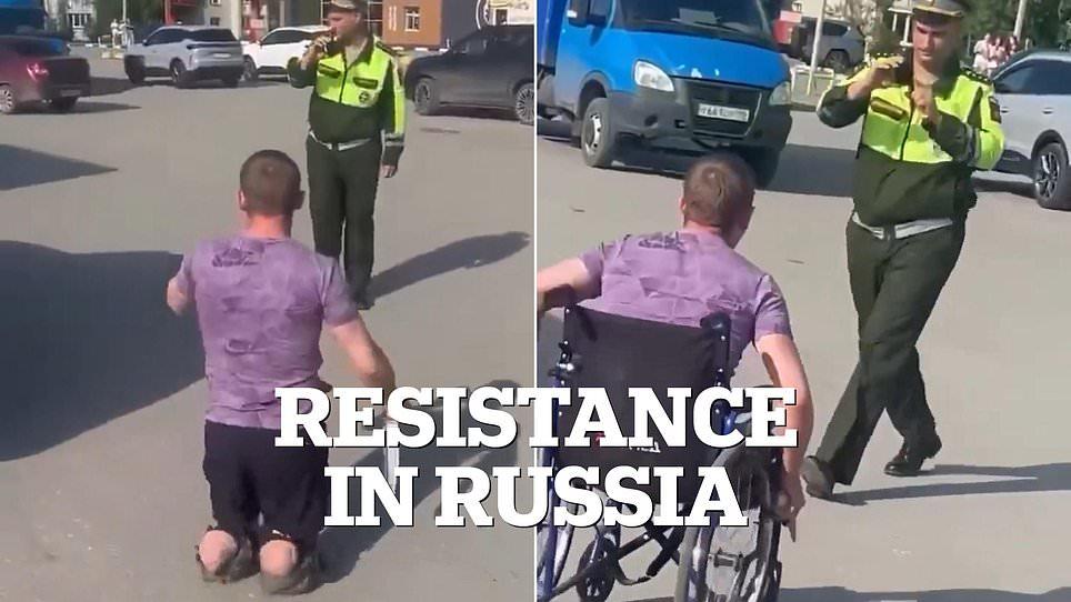 Putin 'prepares mass call-up' for the Ukraine meat-grinder - as video shows Russian veteran with no legs threatening recruiter with a knife in sign of growing resistance facing desperate Kremlin