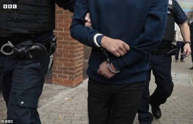 Three arrested in raids on suspected gang that 'helps migrants pretend to be gay for asylum'